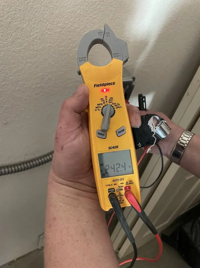 Voltage testing with clamp meter during Generator Installation in Seaside Park